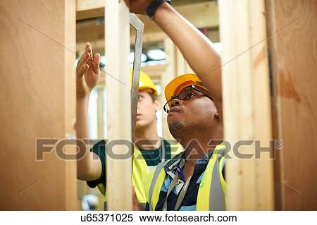 Male higher education students building wooden framework in college workshop View Large Photo Image Stock Photography - Male higher education students building wooden framework in college workshop. Fotosearch