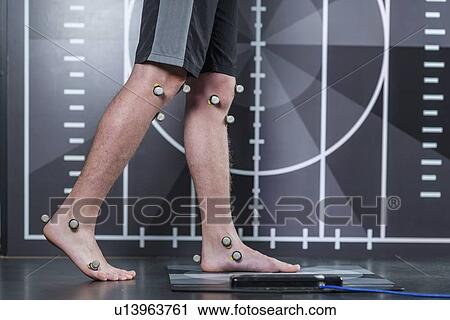 Stock Image - Markers for gait analysis. Fotosearch