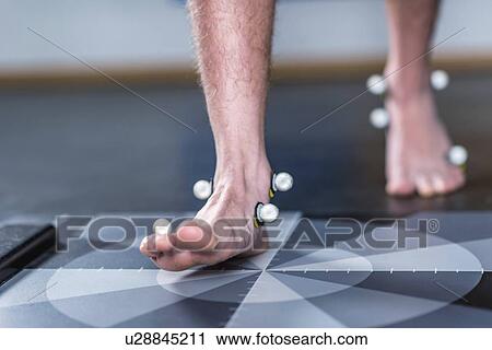 Stock Image - Markers for gait analysis. Fotosearch