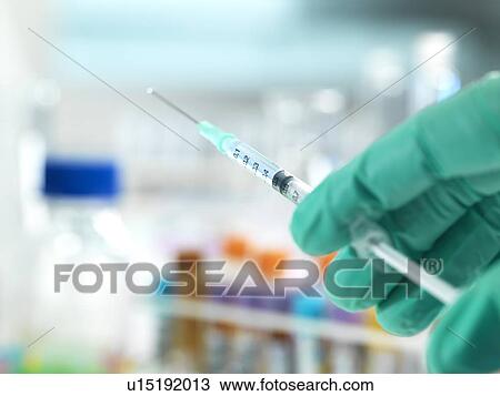 Stock Image - Medical injection. Fotosearch