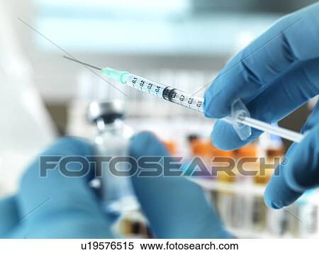 Stock Photography - Medical injection. Fotosearch