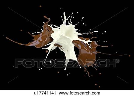 Stock Image - Milk and chocolate, or paint splashing against each other in the air. On black background.. Fotosearch