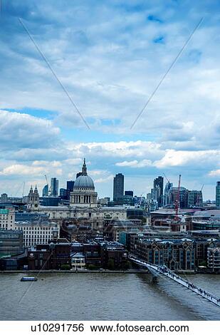 Stock Photograph - Millennium Bridge over River Thames, St Paul's Cathedral in background, London, England, UK. Fotosearch