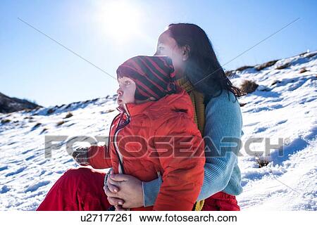 Stock Image - Mother and son in Piani Resinelli, Lombardy, Italy. Fotosearch