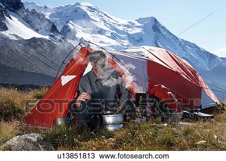 Mountain climber camping, Chamonix, Rhone-Alps, France View Large Photo Image Stock Image - Mountain climber camping, Chamonix, Rhone-Alps, France. Fotosearch