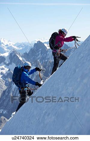 Picture - Mountain climber on snowy slope, Chamonix, Rhone-Alps, France. Fotosearch