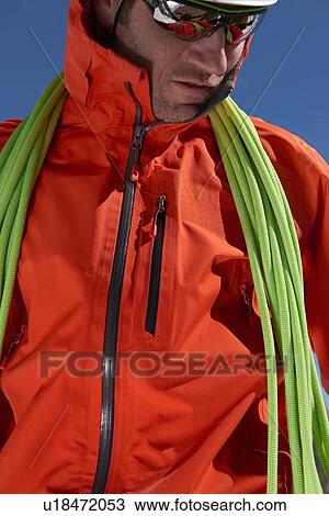 Mountaineer with climbing ropes View Large Photo Image Stock Image - Mountaineer with climbing ropes. Fotosearch