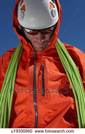 Mountaineer with climbing ropes View Large Photo Image Stock Image - Mountaineer with climbing ropes. Fotosearch