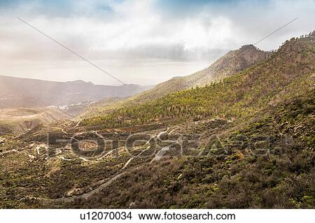 Mountainous landscape with rural roads, high angle view, San Bartolome de Tirajana, Canary Islands, Spain View Large Photo Image Picture - Mountainous landscape with rural roads, high angle view, San Bartolome de Tirajana, Canary Islands, Spain. Fotosearch