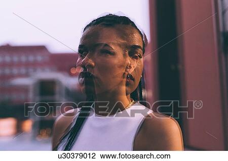 Stock Image - Multiple exposure portrait of woman. Fotosearch