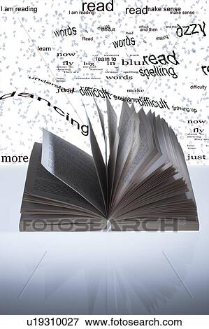 Stock Photo - Open book and dyslexia, conceptual image. Dyslexia is a learning disorder that manifests itself as a difficulty with reading and spelling.. Fotosearch
