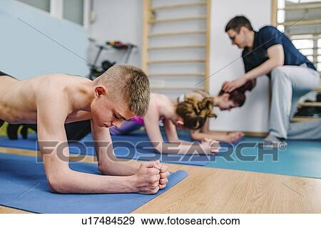 Physical therapist with teenagers View Large Photo Image Stock Photo - Physical therapist with teenagers. Fotosearch