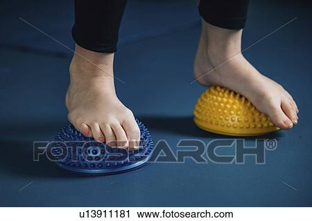 Stock Image - Physical therapy tools for flat feet. Fotosearch
