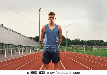 Portrait of athlete on running track View Large Photo Image Stock Image - Portrait of athlete on running track. Fotosearch