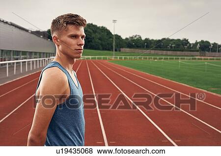 Portrait of athlete on running track View Large Photo Image Stock Photo - Portrait of athlete on running track. Fotosearch