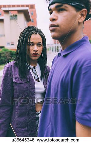 Portrait of brother and sister with braided hair and bandana View Large Photo Image Stock Photograph - Portrait of brother and sister with braided hair and bandana. Fotosearch