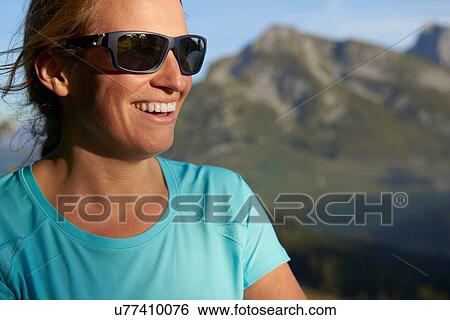 Portrait of hiker, mountains in background, Manigod, Rhone-Alpes, France View Large Photo Image Stock Photograph - Portrait of hiker, mountains in background, Manigod, Rhone-Alpes, France. Fotosearch