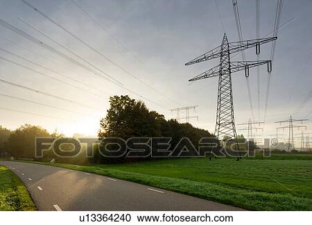 Stock Image - Power lines near coal fired power station, Netherlands. Fotosearch