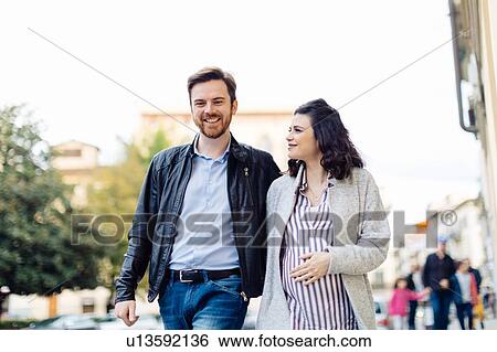 Pregnant couple walking, Florence, Italy View Large Photo Image Stock Photograph - Pregnant couple walking, Florence, Italy. Fotosearch