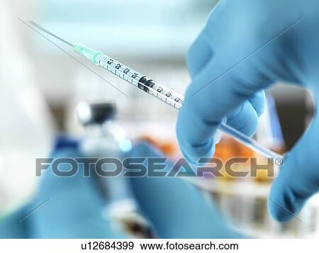 Preparing vaccine View Large Photo Image Stock Photo - Preparing vaccine. Fotosearch