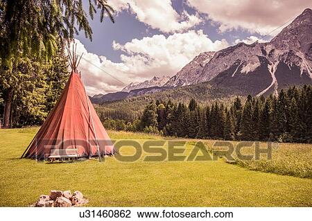 Red teepee in valley landscape, Ehrwald, Tirol, Austria View Large Photo Image Stock Image - Red teepee in valley landscape, Ehrwald, Tirol, Austria. Fotosearch