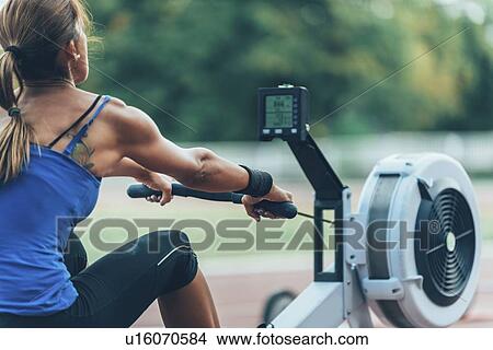 Picture - Rowing machine competition. Fotosearch
