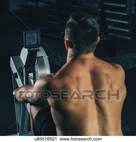 Rowing machine workout View Large Photo Image Stock Image - Rowing machine workout. Fotosearch