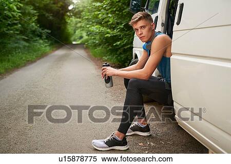 Runner sitting in van View Large Photo Image Stock Photography - Runner sitting in van. Fotosearch