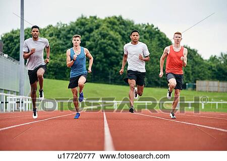 Stock Photo - Runners training on running track. Fotosearch