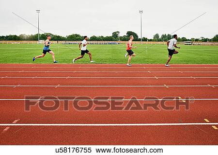 Stock Photography - Runners training on running track. Fotosearch