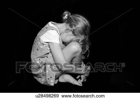 Stock Photo - Sad girl. Fotosearch