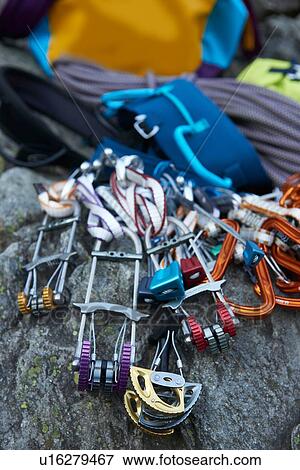 Stock Photo - Safety harness and climbing ropes. Fotosearch