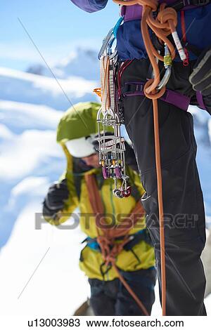 Stock Image - Safety harness worn by mountaineer. Fotosearch