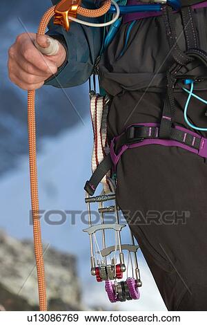 Stock Photo - Safety harness worn by mountaineer. Fotosearch