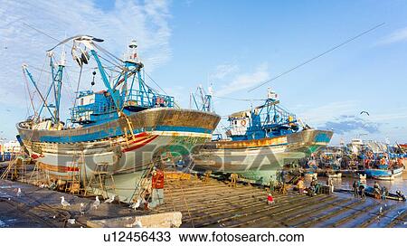 Ships and boats in harbour, Essaouira, Morocco View Large Photo Image Stock Image - Ships and boats in harbour, Essaouira, Morocco. Fotosearch