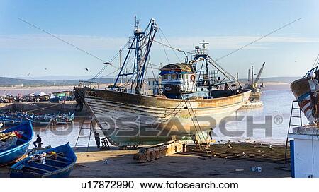 Ships and boats in harbour, Essaouira, Morocco View Large Photo Image Stock Image - Ships and boats in harbour, Essaouira, Morocco. Fotosearch