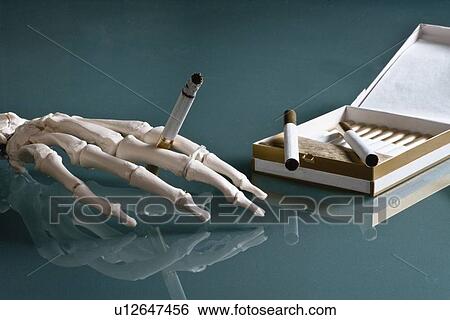 Stock Photograph - Skeleton smoking. Fotosearch