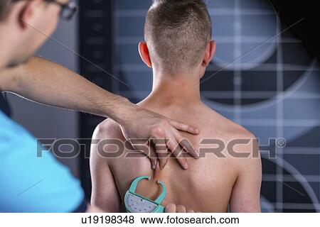 Stock Photo - Skinfold test for body fat. Fotosearch