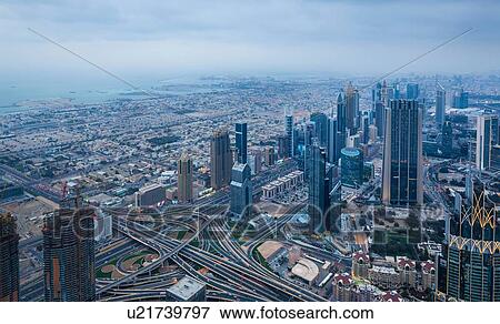 Skyscrapers along Sheikh Zayed Road, Dubai, UAE View Large Photo Image Stock Photo - Skyscrapers along Sheikh Zayed Road, Dubai, UAE. Fotosearch