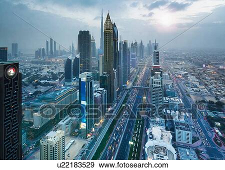 Skyscrapers along Sheikh Zayed Road, Dubai, UAE View Large Photo Image Stock Photo - Skyscrapers along Sheikh Zayed Road, Dubai, UAE. Fotosearch