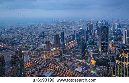 Skyscrapers along Sheikh Zayed Road, Dubai, UAE View Large Photo Image Stock Photograph - Skyscrapers along Sheikh Zayed Road, Dubai, UAE. Fotosearch