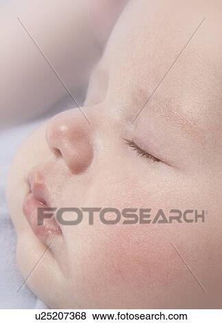 Stock Photo - Sleeping baby boy, aged 7 weeks.. Fotosearch