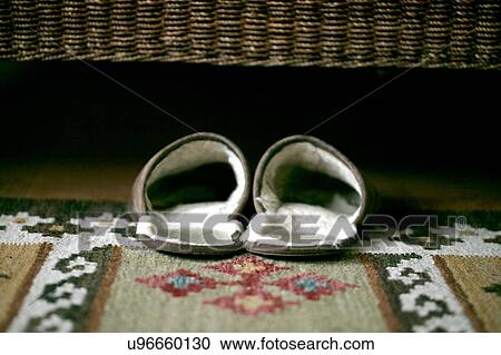 Slippers under bed View Large Photo Image Stock Image - Slippers under bed. Fotosearch