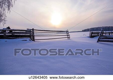 Snow covered landscape and fence at sunset View Large Photo Image Stock Photography - Snow covered landscape and fence at sunset. Fotosearch
