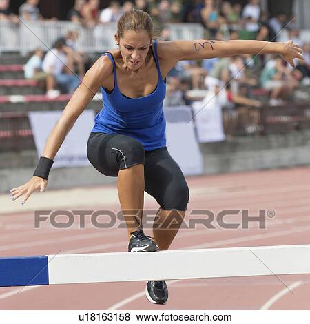 Stock Photo - Steeplechase runner. Fotosearch