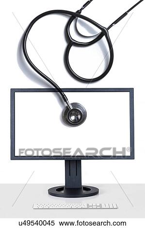 Stock Photography - Stethoscope and computer screen depicting computer health and telehealth.. Fotosearch