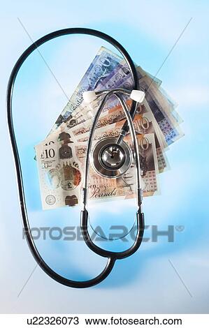 Stethoscope and money depicting medical costs. View Large Photo Image Stock Image - Stethoscope and money depicting medical costs.. Fotosearch