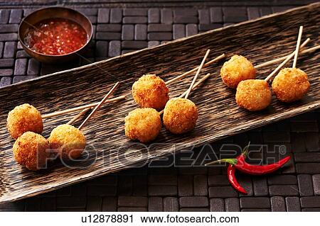 Still life with panko lollipops, asian canapes View Large Photo Image Stock Image - Still life with panko lollipops, asian canapes. Fotosearch
