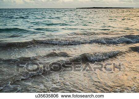 Stock Photograph - Sunrise at Kailua Beach, Oahu, Hawaii. Fotosearch