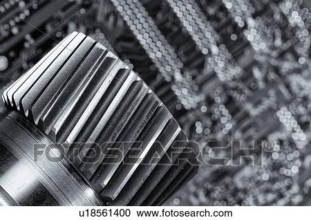 Titanium gear calibrated by computer. Circuit board in the background. View Large Photo Image Stock Image - Titanium gear calibrated by computer. Circuit board in the background.. Fotosearch